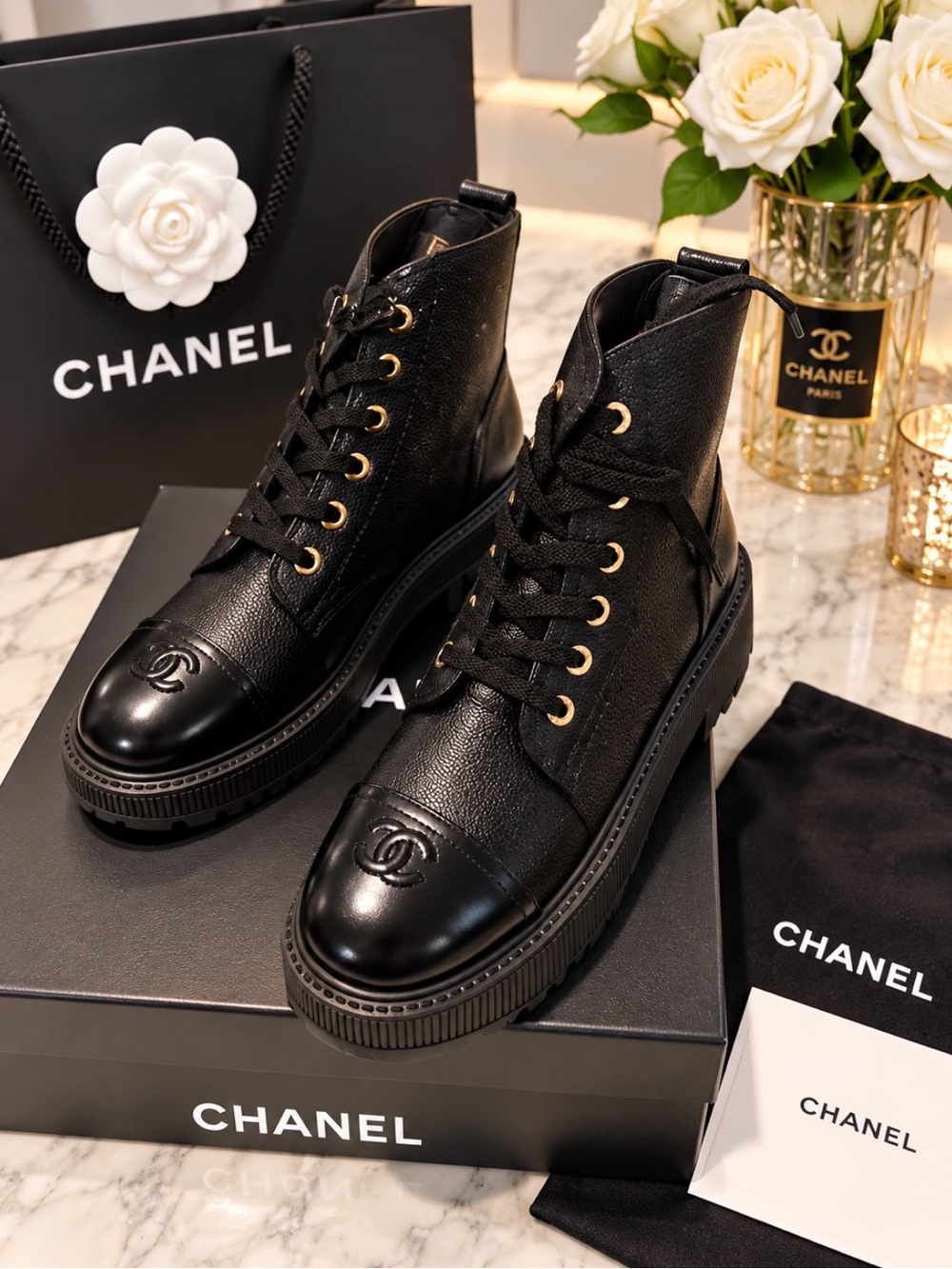 CHANEL Black Leather Lace-Up Combat Boots with Gold-Tone Eyelets